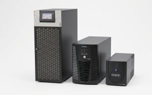 Numeric UPS range by Legrand showing a large three-phase floor-standing UPS, a mid-range tower UPS and a compact desktop UPS covering different VA ratings, stocked at eNarayan Elex Hyderabad